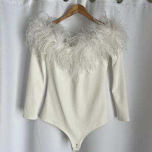 White leotard top with feathers